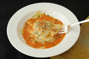 Veal stuffed ravioli with sweet red pepper sauce