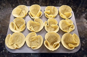 12 taco cups in baking tray